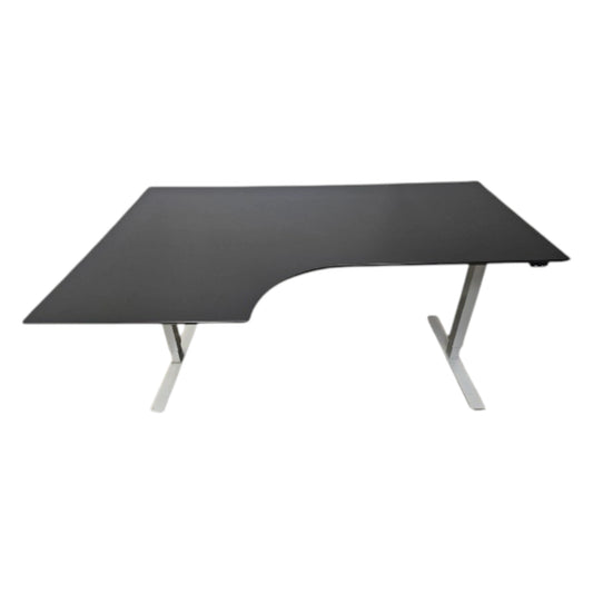 Fabriksnyt hæve sænkebord med fumac combi-bordplade i sort nanolaminat.